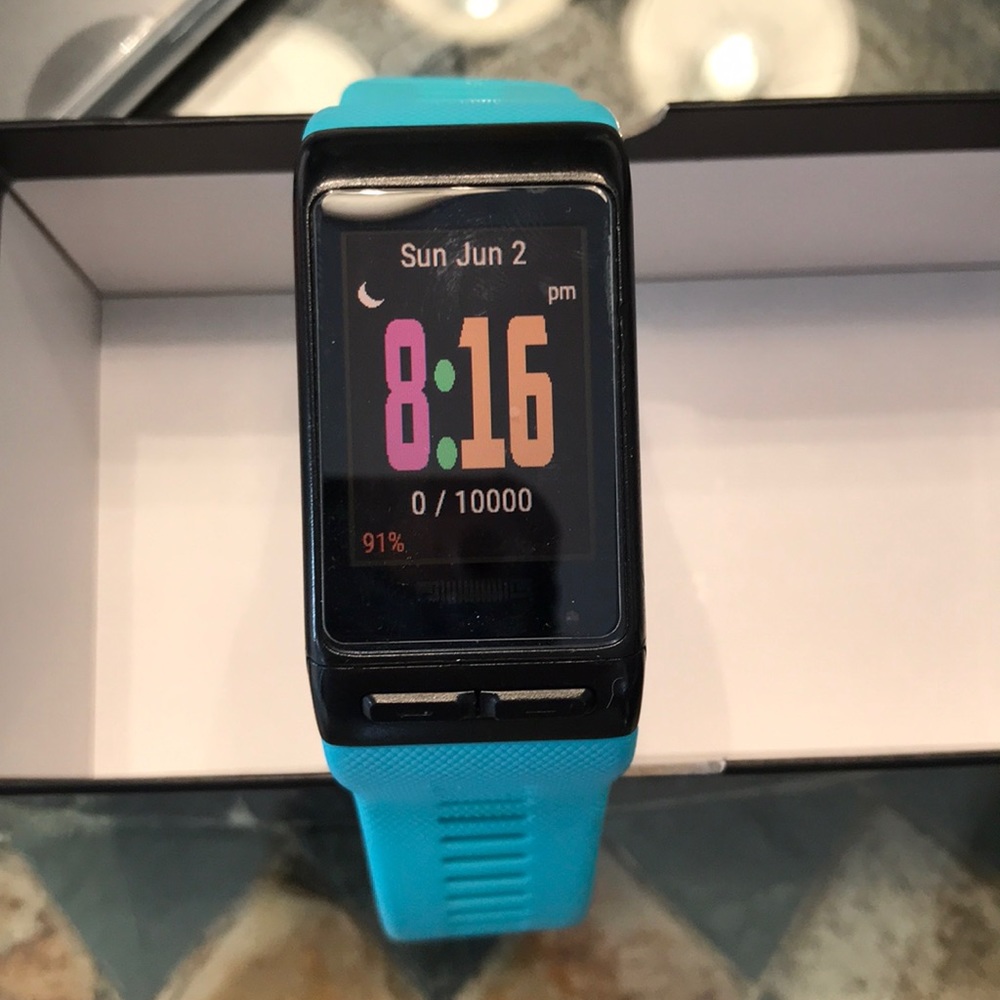 Garmin Vivoactive HR with teal band